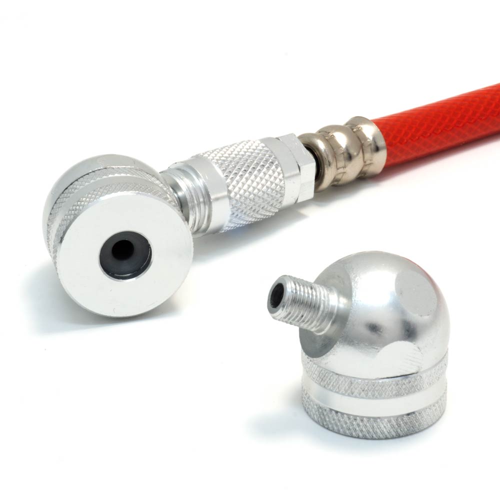 Close-up of the Prestacycle Big Angle Presta Head, featuring a red air hose with a silver connector and separate silver fitting—ideal for inflating tires or connecting to an air compressor, compatible with tubeless valves.