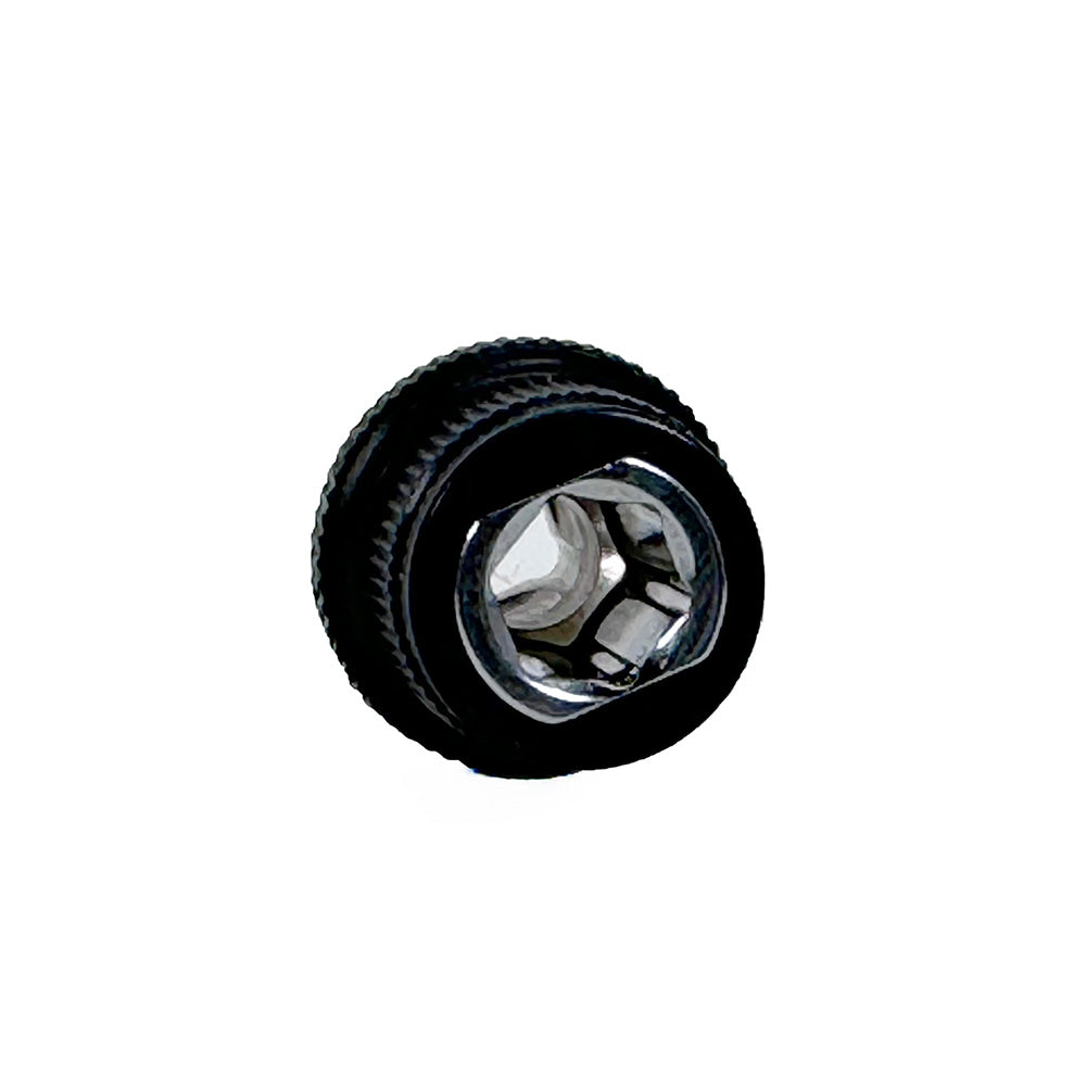 A close-up of the Prestacycle 1/4” Square to Hex Bits Quick Release Adapter by Prestacycle, a black circular metal tool with a shiny silver threaded interior, isolated on a white background.