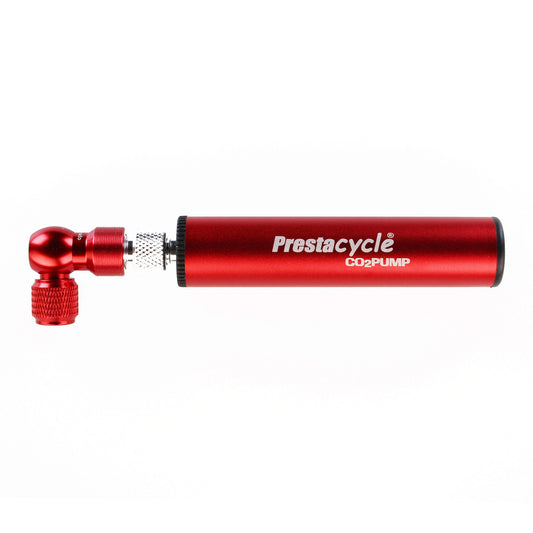 A red Prestaflator Micro - CO2 / Pump Bundle with a black end cap and metallic inflation head for Presta valves is displayed horizontally on a plain white background.