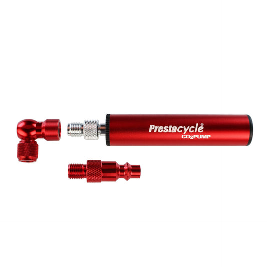 The Prestaflator Micro CO2 / Air Compressor / Pump Bundle in red, with two detachable metal nozzles and a presta valve adapter, is arranged separately on a white background.