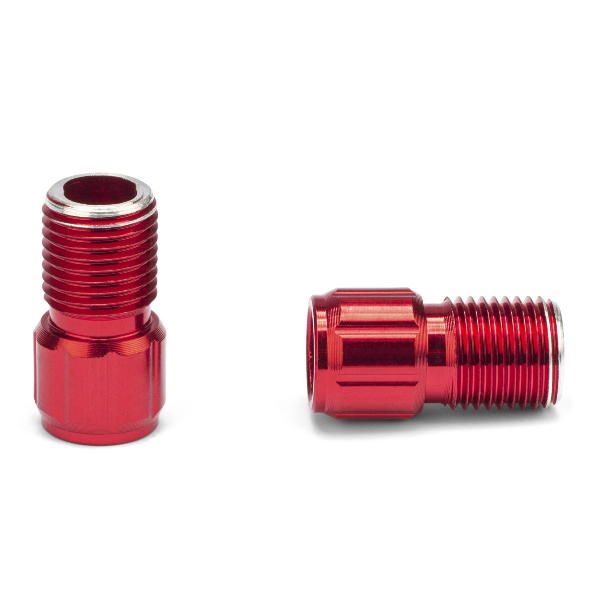 Two red Prestacycle Prestadapter fittings are shown—one upright, one lying down—both crafted from lightweight alloy with machined grooves and silver edges, serving as Schrader to Presta adapters and valve core tools.