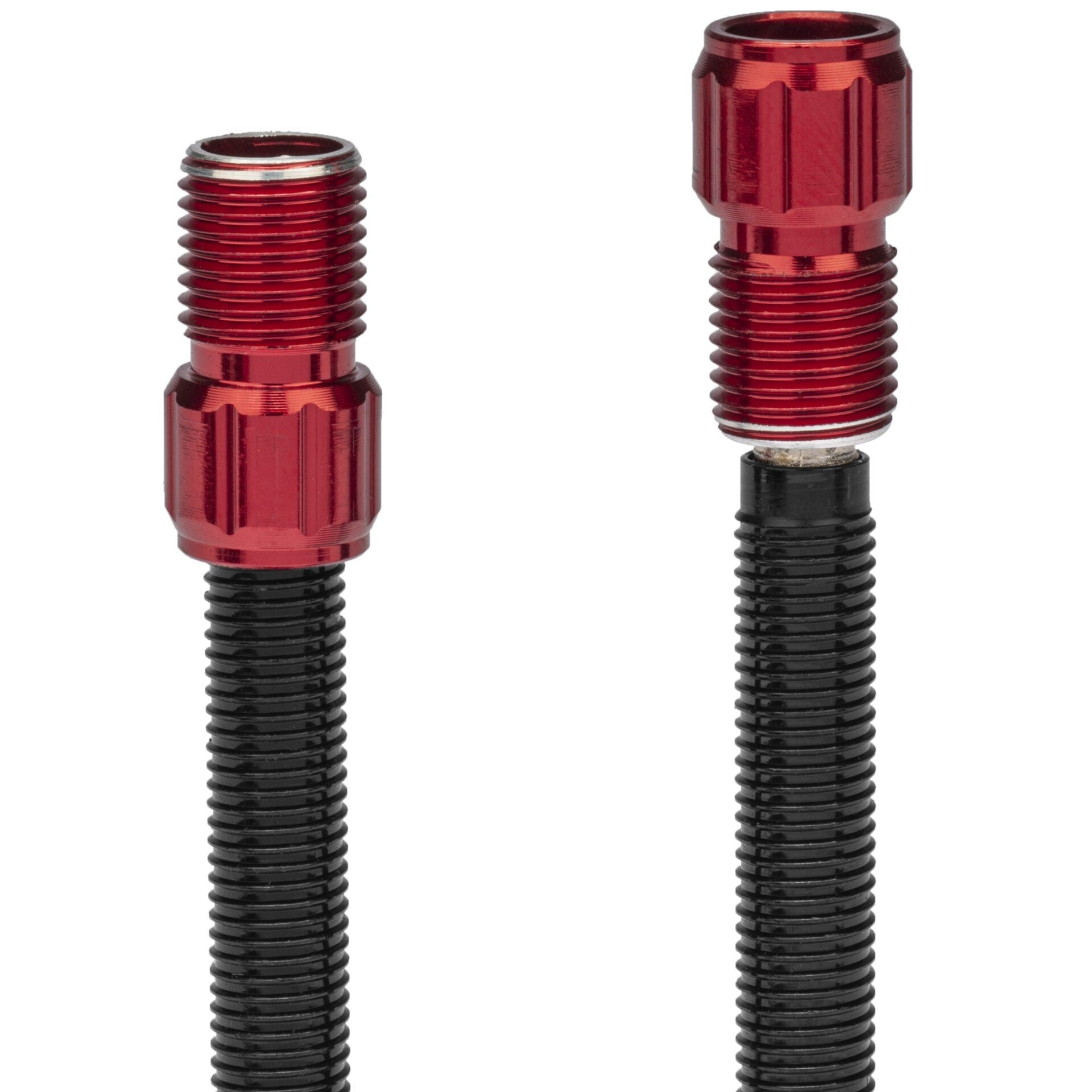 Close-up of two Prestacycle Prestadapter Schrader to Presta adapters with red metal caps, crafted from lightweight alloy, shown vertically side by side on a white background.