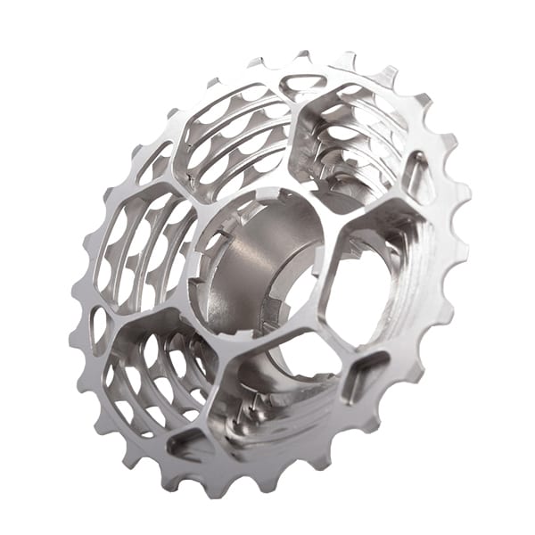 A close-up of the Prestacycle UniBlock PRO Cassette (10 Speed) for Campagnolo, featuring a metallic cog with a hollow, honeycomb-like design, viewed at an angle on a white background.