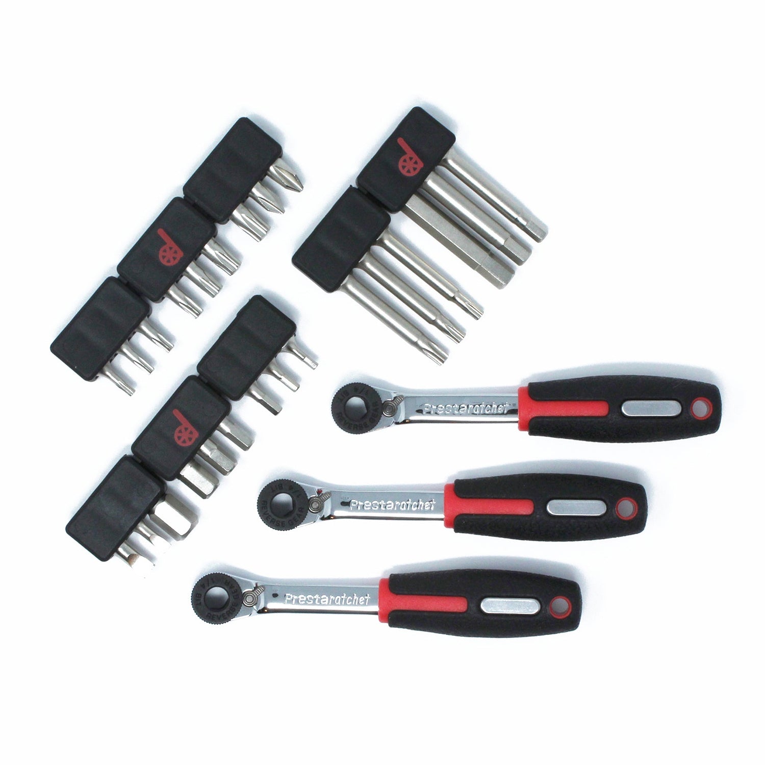 The Prestaratchet Pro - Mini Ratchet Bicycle Tool Workshop Set includes three reversible screwdrivers with black and red handles and multiple interchangeable bits in black holders, all neatly arranged on a white background.