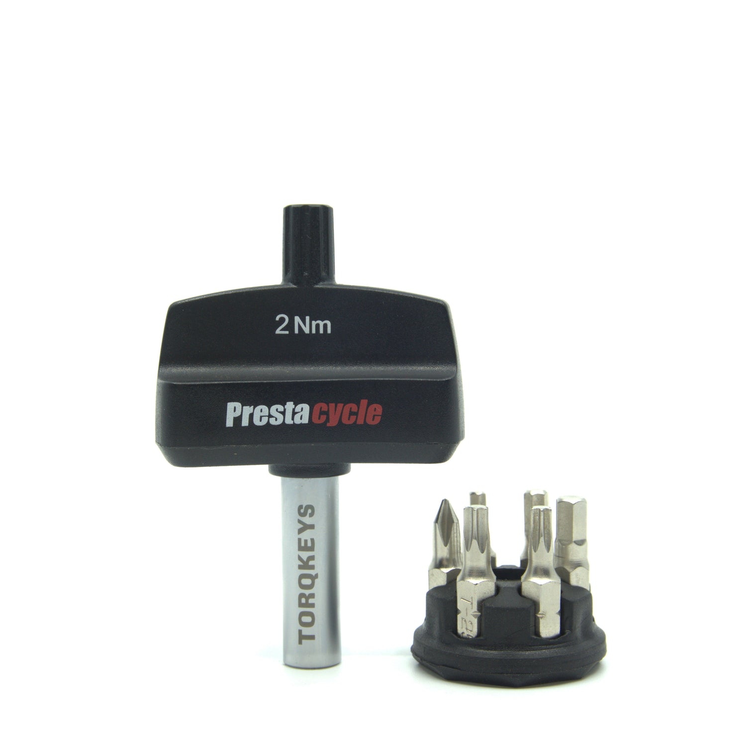 A Prestacycle Mini TorqKeys 2Nm preset torque tool stands upright beside its black holder containing six interchangeable bits, all displayed on a white background.