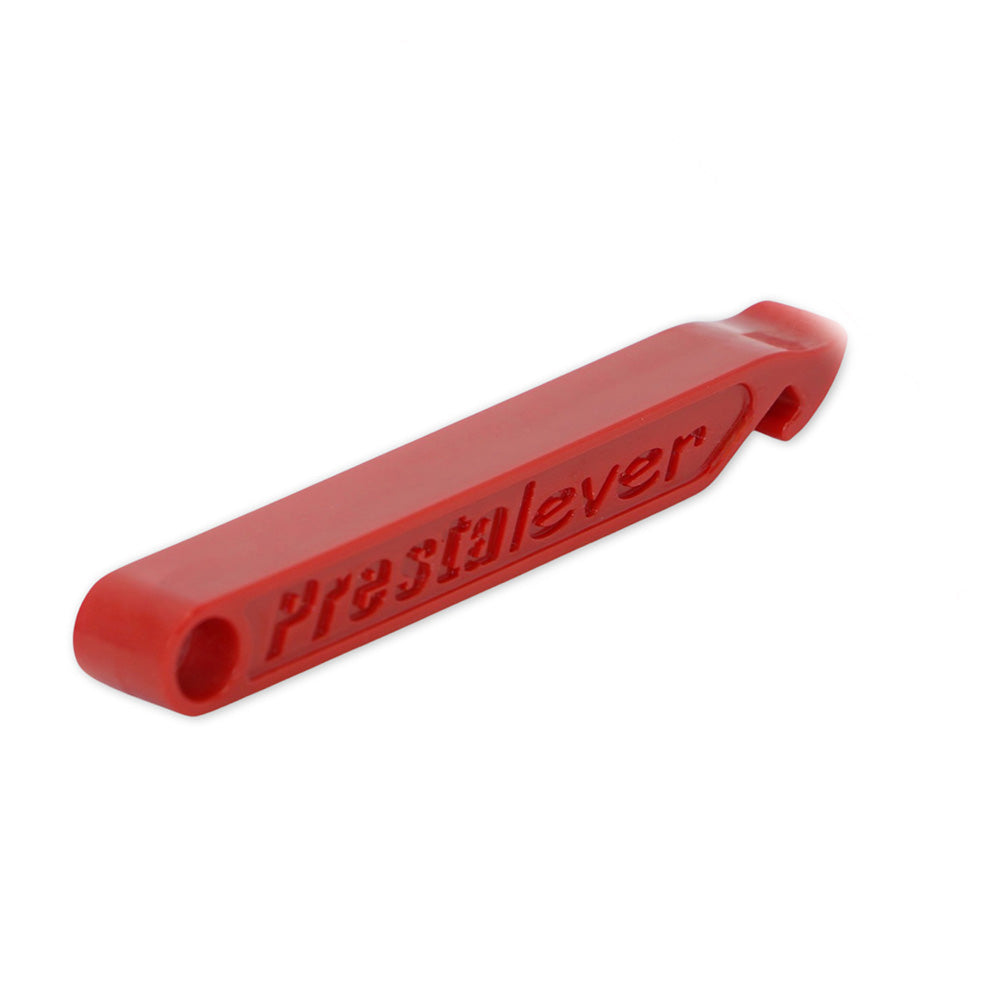 The Prestalever Third-Hand Tyre Holder is a red plastic tool with Prestalever embossed on the side, designed to help remove bicycle tires from rims.