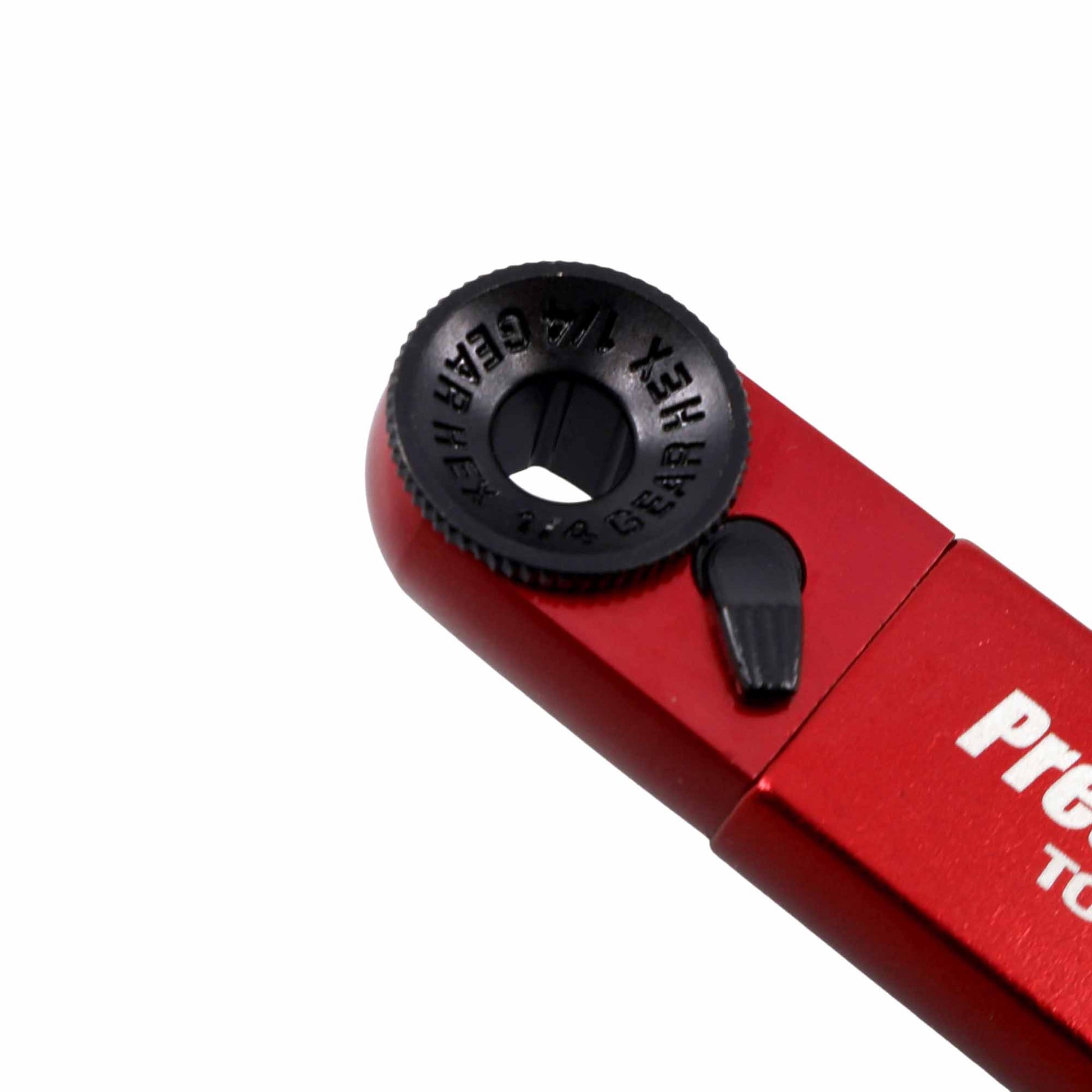 Close-up of the Prestacycle TorqRatchet ELITE Lite, a red reversible bike multi-tool with a black 1/4 GEAR HEX gear on the head and part of the white PRE text on the handle.