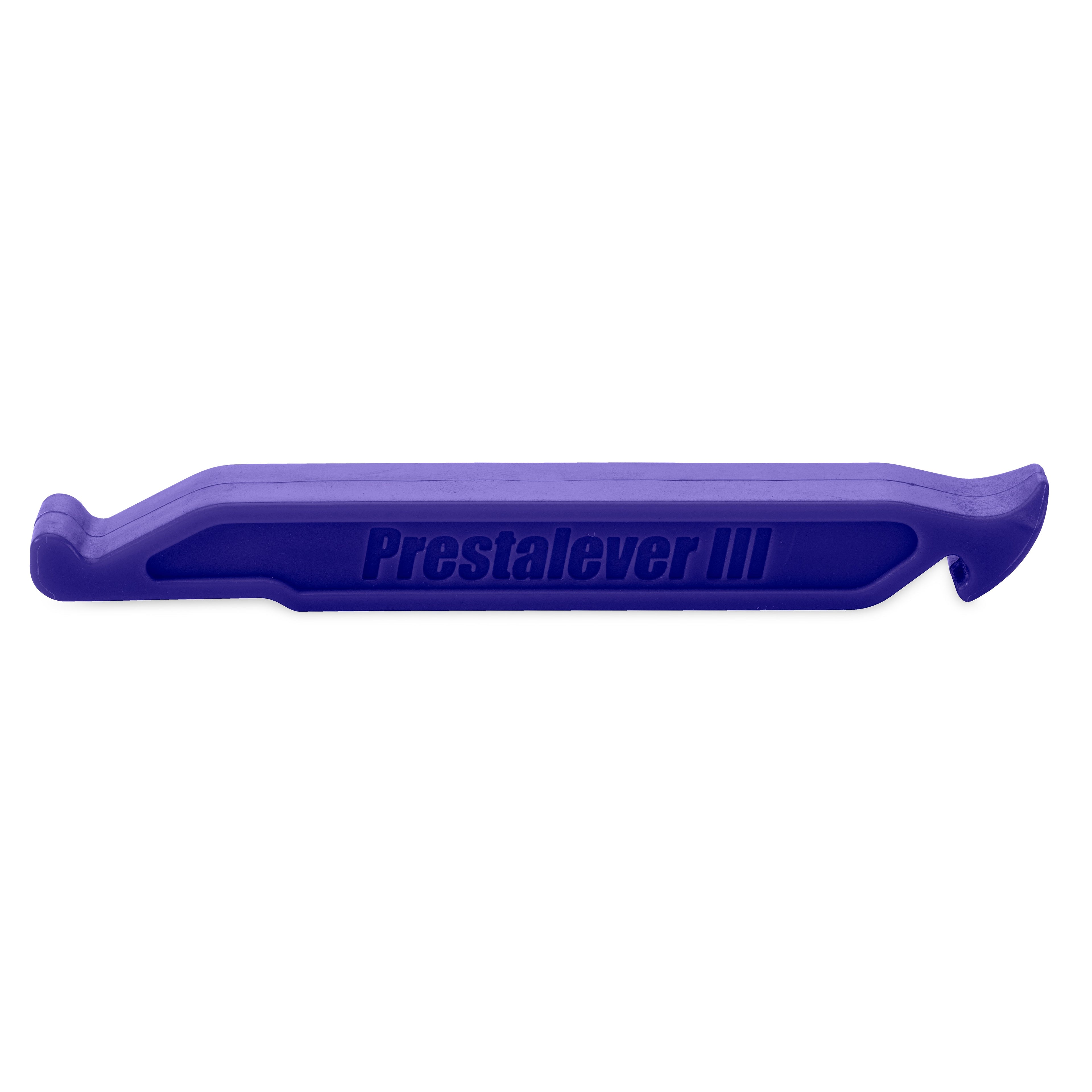 The Prestalever GO - 4/5 Function Multi-tool Tire Lever is a purple plastic tool for removing bicycle tires and servicing Presta valve cores, shown on a white background.