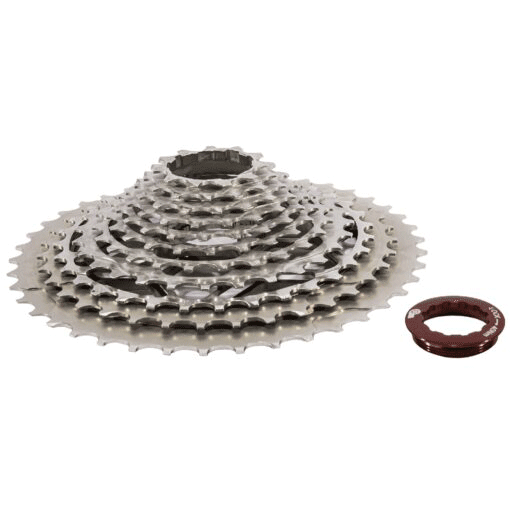 The Prestacycle Uniblock PRO Gravel Cassette (11 Speed, Shimano) features multiple silver chromoly steel sprockets stacked together, shown alongside a separate small red lockring on a white background.