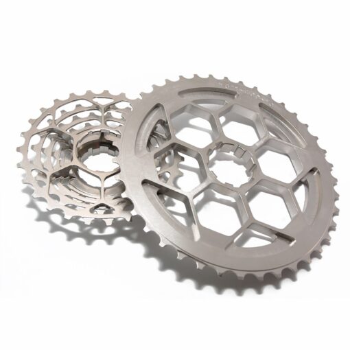 Two chromoly steel bicycle sprockets with hexagon cutouts overlap on a white background. Ideal for 11-speed setups such as the Prestacycle Uniblock PRO Gravel Cassette (Shimano).